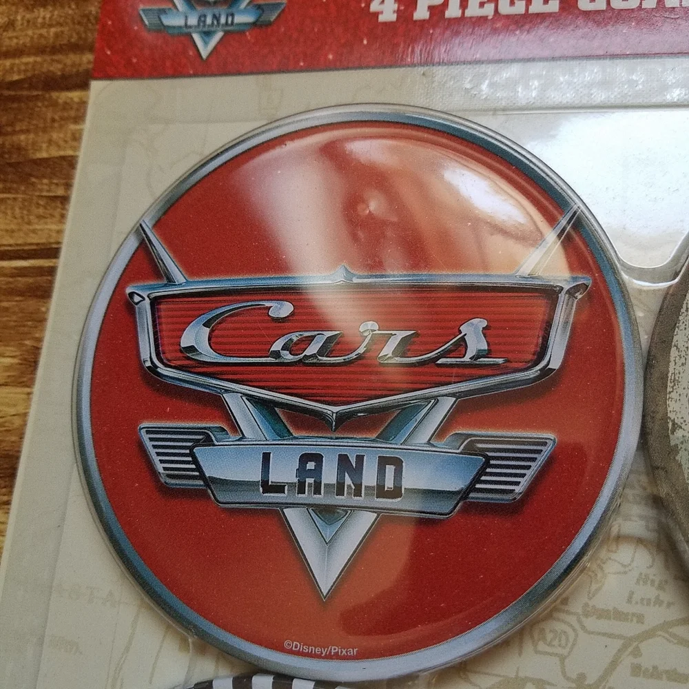 Pixar Cars Land 4 Piece Coaster Set Disney Parks Mater Lightning McQueen NWT